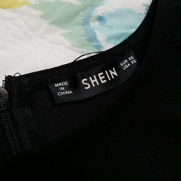 Mini black dress with a fringe bottom - Picture 4 of 5